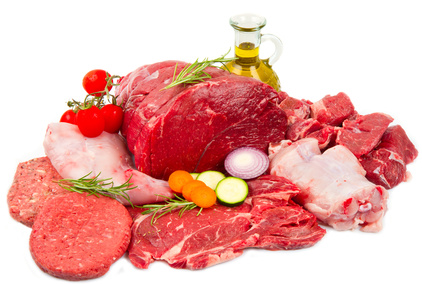 Fresh butcher cut meat assortment garnished